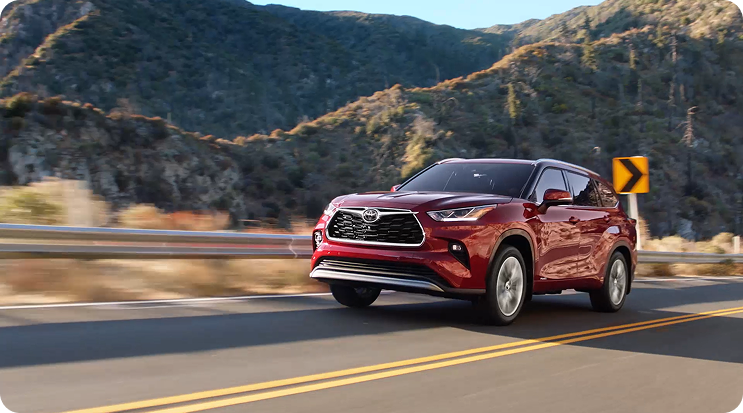 Highlander driving on highway