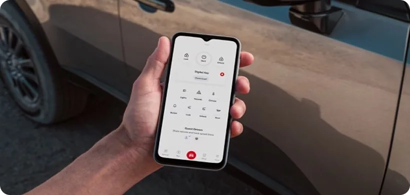 Toyota app remote start and door-lock controls on a smartphone