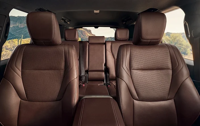 Leather-trimmed second-row bench seats inside the Land Cruiser