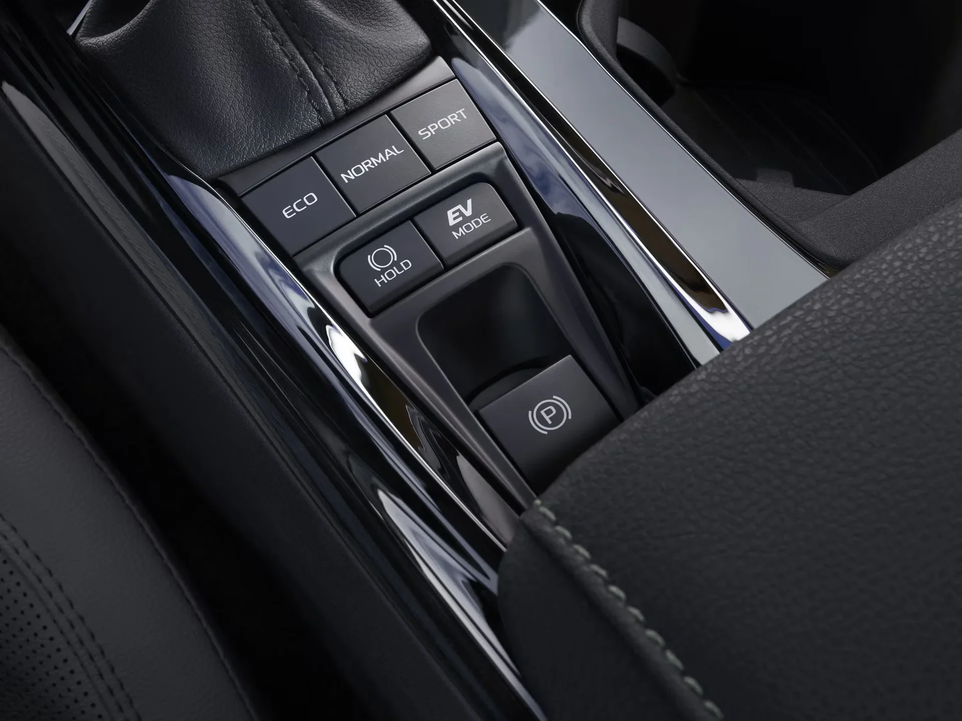 The Camry drive mode buttons on the center console