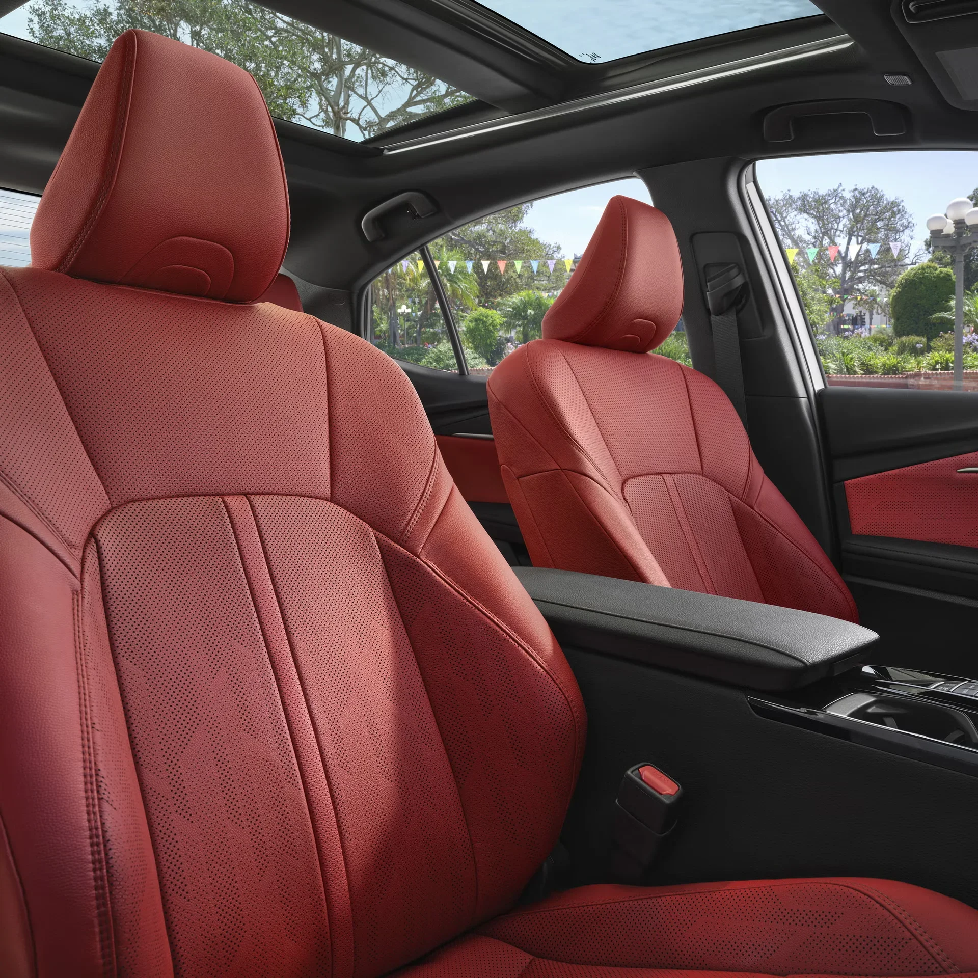 Red leather front seats in a Camry